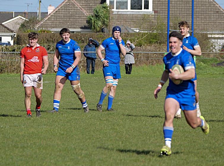 Another great try by centre Liam Hughes for The Blues. Picture William John